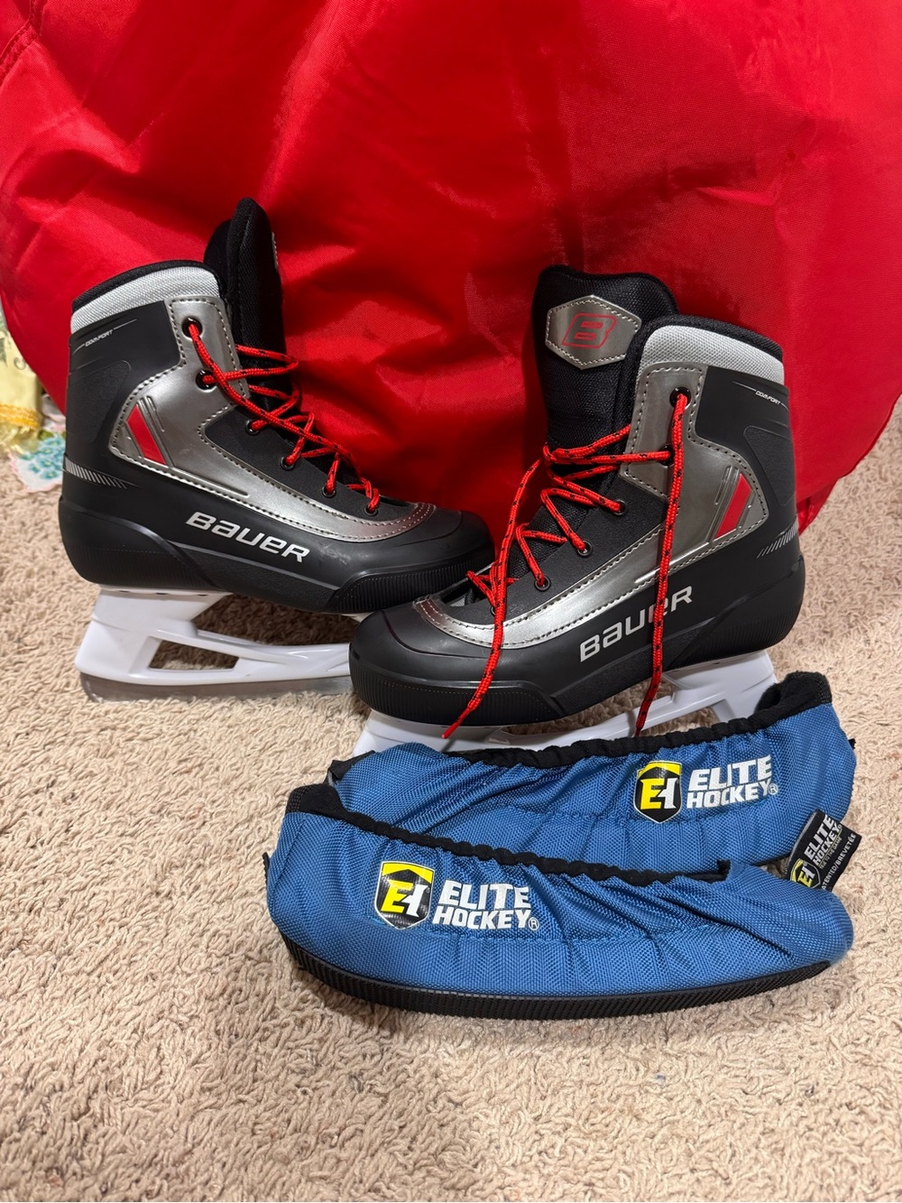 Bauer Black, Silver & Red Youth Ice Hockey Skates with Blue Blade Covers